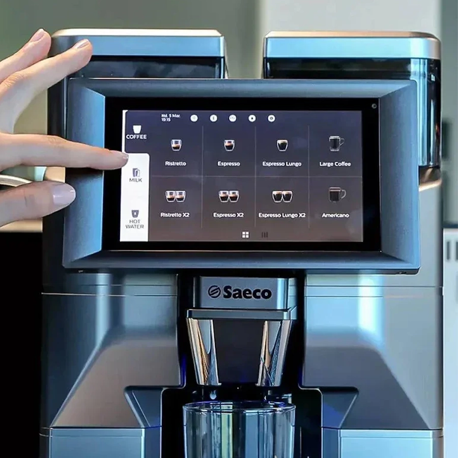 Saeco Magic M2+ preparing two creamy espresso beverages
